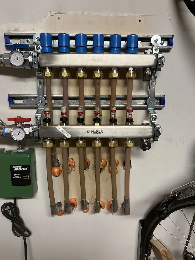 Plumber performing Gas Line Installation at a residential property in Roselawn